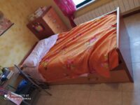 Camera tripla con armadio e letto ospite