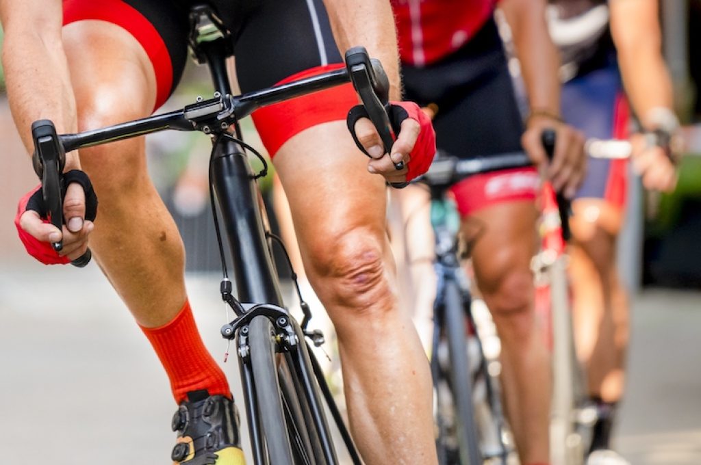 detail of bike and feet of a cyclist in a bicycle race